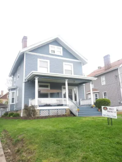 Clean house with green front yard