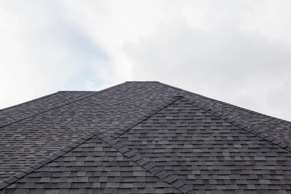 Black roof with sky at the background